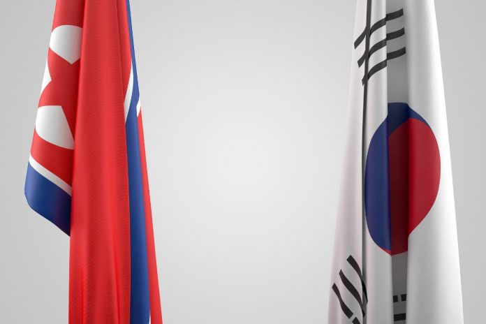 Flagi Korei Północnej oraz Korei Południowej