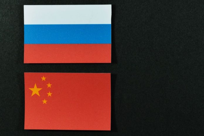Flagi Rosji i Chin
