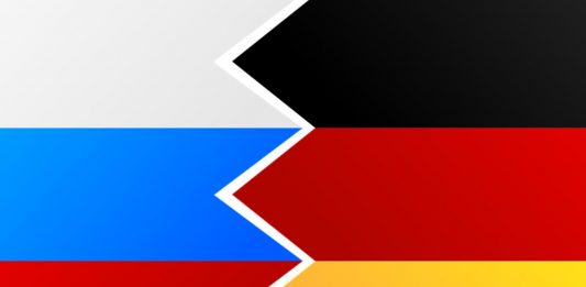 Flagi Rosji i Niemiec.