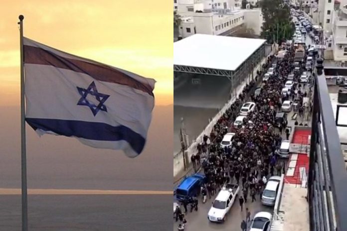 Flaga Izraela oraz marsz żałobny po śmierci trzech Palestyńczyków w wyniku starć z izraelskimi żołnierzami na Zachodnim Brzegu Jordanu.