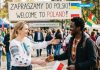 Ukrainka oraz imigrant z Afryki. Obrazek ilustracyjny
